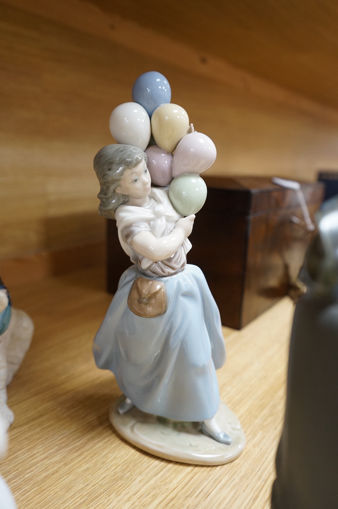 A collection of Lladro to including an eskimo and polar bear group, 23cm high (9)
